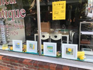Art in August display window