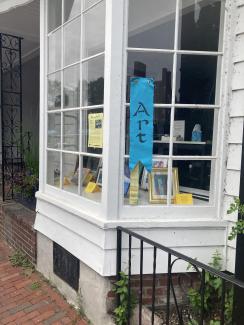 Art in August artworks in shop window